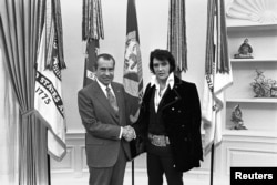 President Richard Nixon shakes hands with Elvis Presley in the Oval Office in Washington, D.C., in December 1970.