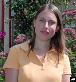 River Smart homeowner Lesly Baesens put in native plants and trees, porous pavers and a rain barrel through a city grant