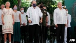 រាប់ពីស្តាំ ប្រធានាធិបតី​ម៉ិកស៊ិក​លោក Andres Manuel Lopez Obrador ប្រធានាធិបតី​ក្វាតេម៉ាឡា​លោក Alejandro Giammattei និង​រដ្ឋមន្រ្តី​ក្រសួង​មហាផ្ទៃ​អ្នកស្រី Olga Sanchez Cordero នៅក្នុង​ពិធី​ប្រកាស​សូមអភ័យទោស​ជា​ផ្លូវការ​ដល់​ជនជាតិ​ដើម​ម៉ាយ៉ាន នៅ​ថ្ងៃទី៣ ខែឧសភា ឆ្នាំ២០២១។