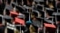 FILE - Students attend graduation ceremonies at the University of Alabama in Tuscaloosa, Alabama, Aug. 6, 2011.