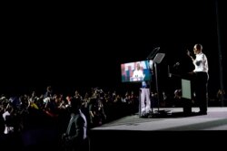 Former President Barack Obama speaks at a rally as he campaigns for Democratic presidential candidate former Vice President Joe Biden, Nov. 2, 2020, in Miami.