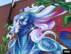 Detail from mural by Aniekan Udofia, Washington, D.C., July, 2014. (J. Taboh/VOA)