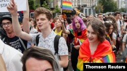 Participants take part at the Equality March, organized by the LGBT community in Kyiv, June 23, 2019.