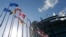 Flags of European Union member states fly in front of the European Parliament building in Strasbourg, France, April 15, 2014. 
