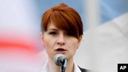 RUSSIA -- Maria Butina, leader of a pro-gun organization in Russia, speaks to a crowd during a rally in support of legalizing the possession of handguns in Moscow, April 21, 2013