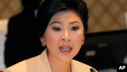 PM Thailand Yingluck Shinawatra membela dirinya terhadap tuduhan korupsi terkait program subsidi beras Thailand (foto: dok). 