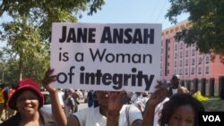 Protesters carry signs during a Jane Ansah solidarity march in Blantyre, Malawi, July 10, 2019. (Lameck Masina)