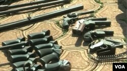 FILE - Weapons said to have been seized from separatist fighters are seen displayed in Bamenda, northwestern Cameroon, Feb. 6, 2019. (Moki Edwin Kindzeka/VOA)