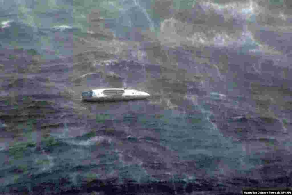 In this photo provided by the Australian Defense Force Lithuanian rower Aurimas Mockus' boat is photographed in heavy seas in the Coral Sea off the northeast coast of Australia, Saturday, March 1, 2025