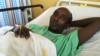Salah Sabdow Farah was shot when the bus he was traveling in was attacked by al-Shabab militants in December 2015. He is recovering at Nairobi's Kenyatta National Hospital in January 2016.(J. Craig/VOA)