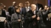 Palestinian Ambassador to the United Nations Riyad Mansour (L) and Jordanian Ambassador Dina Kawar leave a meeting of Arab states at U.N. headquarters, Dec. 29, 2014.