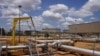 Pipelines criss-cross at the Paloch oil field in South Sudan on Sunday, May 5, 2013.