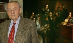 FILE - Bernd Freytag von Loringhoven poses in front of a painting of his ancestors at his home in Munich, Germany, April 29, 2005. Freytag von Loringhoven, who was part of Adolf Hitler's entourage in the final weeks of World War II, died in 2007.