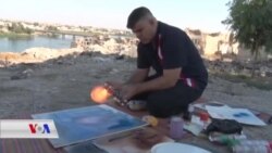 Binêrin Hunermendê Mûsilê Çawa bi Agir Wêneyan Çêdike