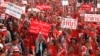 Members of the pro-government "red shirt" group take part in a rally in Nakhon Pathom province, on the outskirts of Bangkok, May 11, 2014. 