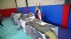 FILE - The purported wreckage of an American drone is seen displayed by the Islamic Revolutionary Guard Corps in Tehran, Iran, June 21, 2019.