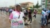  Cancer survivor Zainab Mohammad takes part in a cancer awareness walk in Abuja, Nigeria, Oct. 26, 2019. (Timothy Obiezu/VOA)