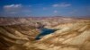 FILE - A part of Band-e-Amir is seen in this photo in Bamiyan province of Afghanistan, Nov. 8, 2016. The cascading collection of deep-blue high-mountain lakes became Afghanistan's first provisional national park in 2009.