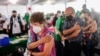 Elderly people are seen after receiving a dose of the CoronaVac vaccine against COVID-19 at a vaccination center in Mexico City, on March 17, 2021.