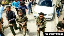 یکی ازعکس های منتشر شده توسط شبکه جام جم از نیروهای ایرانی در خان طومان 