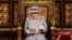 Britain's Queen Elizabeth II delivers a speech in the House of Lords during the State Opening of Parliament at the Palace of Westminster in London, Tuesday May 11, 2021. (Chris Jackson/Pool via AP)