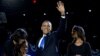 President Barack Obama, accompanied by first lady Michelle Obama and daughters Malia and Sasha, arrives at the election night party in Chicago, early Wednesday, Nov. 7, 2012.