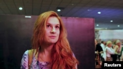 FILE - Maria Butina speaks at 2015 FreedomFest conference in Las Vegas, Nevada, July 11, 2015 in this still image taken from a social media video obtained July 19, 2018.