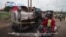 VOA60 Africa - Uganda: Death toll in fuel tanker explosion rises to at least 15