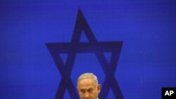FILE - Israeli Prime Minister Benjamin Netanyahu speaks during a press conference in Tel Aviv, Israel, Sept. 10, 2019.