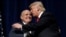 FILE - Republican presidential nominee Donald Trump embraces former New York City Mayor Rudolf Giuliani at a campaign rally in Greenville, N.C., Sept. 6, 2016.