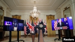 Джо Байден представляет новую инициативу в области национальной безопасности во время виртуальной встречи с премьер-министром Австралии Скоттом Моррисоном и премьер-министром Британии Борисом Джонсоном. 15 сентября 2021г. Белый дом.