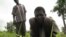 A laborer tends to a field in the Central African Republic, despite his affliction with river blindness. (File)
