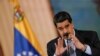 Venezuela's President Nicolas Maduro gestures as he speaks during a news conference in Caracas, Venezuela, Sept. 30, 2019.