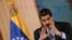 Venezuela's President Nicolas Maduro gestures as he speaks during a news conference in Caracas, Venezuela, Sept. 30, 2019.