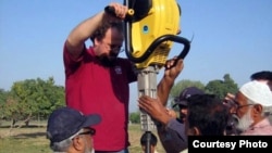 Researchers collect sample sediment cores to chronicle changes in the Indus landscape over time. (Peter D. Clift/University of Aberdeen)