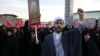 A Muslim cleric chants slogans alongside women in a rally to protest the execution by Saudi Arabia last week of Sheikh Nimr al-Nimr, a prominent opposition Saudi Shiite cleric, in Tehran, Iran, Jan. 4, 2016.