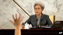 Fu Ying, spokeswoman for the National People's Congress, waits for questions from journalists during a press conference in the Great Hall of the People in Beijing, March 4, 2015. 