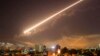 Damascus skies erupt with surface to air missile fire as the U.S. launches an attack on Syria targeting different parts of the Syrian capital Damascus, April 14, 2018.