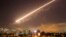 Damascus skies erupt with surface to air missile fire as the U.S. launches an attack on Syria targeting different parts of the Syrian capital Damascus, April 14, 2018.