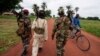 FILE - Members of a rebel group are seen in the town of Bria, Central African Republic, July 15, 2013.