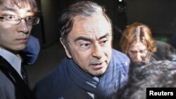 Former Nissan Motor Chairman Carlos Ghosn leaves his lawyer's office in Tokyo, Japan, in this photo taken by Kyodo April 3, 2019.