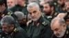 FILE - In this photo provided by an official website of the office of the Iranian supreme leader, Revolutionary Guard Gen. Qassem Soleimani, center, attends a meeting in Tehran, Iran, Sept. 18, 2016.