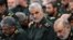 FILE - In this photo provided by an official website of the office of the Iranian supreme leader, Revolutionary Guard Gen. Qassem Soleimani, center, attends a meeting in Tehran, Iran, Sept. 18, 2016.