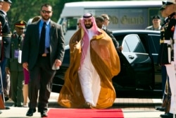 FILE - Mohammad bin Salman Al Saud, then the Saudi Arabia defense minister, arrives to attend the Global Coalition to Counter IS Meeting at Joint Base Andrews, Maryland, outside of Washington, July 20, 2016.