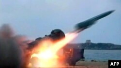 A handout picture released by the Syrian Arab News Agency on July 7, 2012, shows a missile being fired during a military excercise (AFP photo/ HO / SANA).