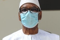 FILE - Mali President Ibrahim Boubacar Keita wears a face mask during the G5 Sahel summit in Nouakchott, Mauritania.