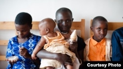 Children enjoy ice cream at Sweet Dreams in Rwanda. (Piper Watson)