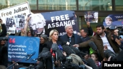 Kristinn Hrafnsson, editor in chief of Wikileaks, and barrister Jennifer Robinson talk to the media outside the Westminster Magistrates Court after WikiLeaks founder Julian Assange was arrested in London, Britain, April 11, 2019.