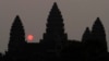 In this file photo, the sun rises behind Angkor Wat at the eastern site of Siem Reap province, some 230 kilometers (143 miles) northwest of Phnom Penh, Cambodia. (AP Photo/Heng Sinith)