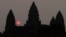 In this file photo, the sun rises behind Angkor Wat at the eastern site of Siem Reap province, some 230 kilometers (143 miles) northwest of Phnom Penh, Cambodia. (AP Photo/Heng Sinith)